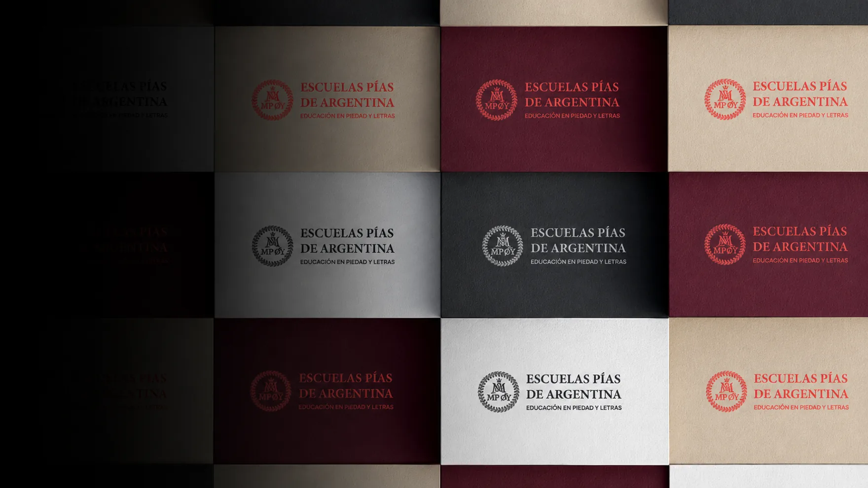 Papelería institucional de Escuelas Pías de Argentina en varios papeles y colores